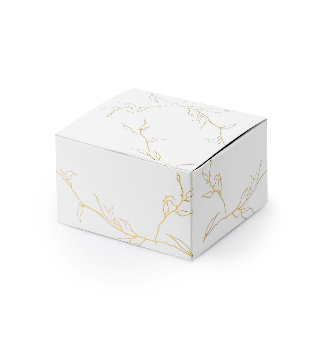 Bílé krabičky se zlatým motivem